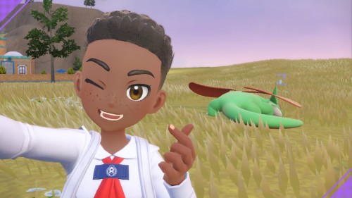my character in Pokémon Violet, a young dark skinned black boy with a curly hi-top, posing with a shiny dragon Pokémon called Salamence
